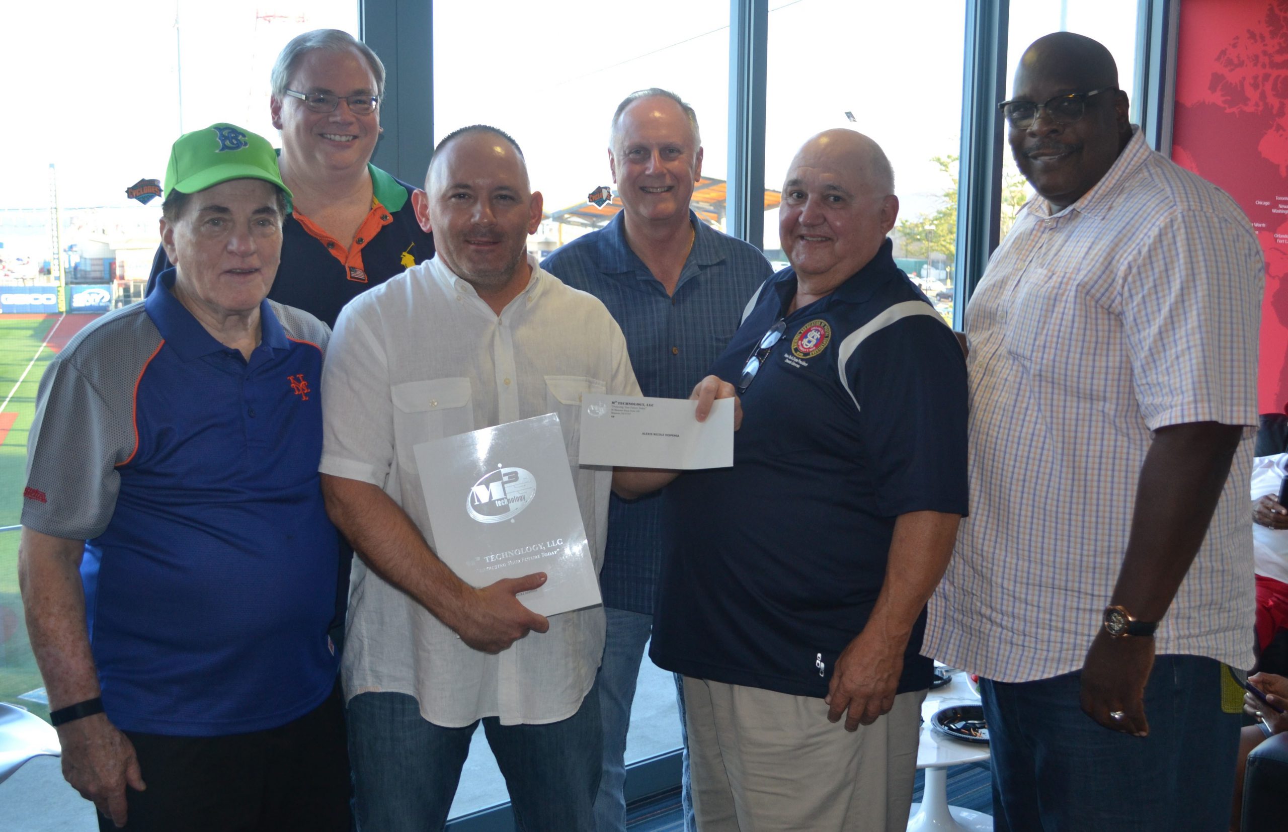 N.Y.S. President Dennis Gawron, second from the right, Presenting M3 Technology Scholarship Award to Father of Nicole Dispensa, Joe Dispensa at Presidents Meeting held at Brooklyn Cyclone Stadium on July 7, 2017
