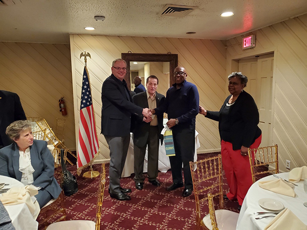 Tommy & Jimmy Congratulating Recent Retiree along with Branch 336 President, Linda Morgan Glover