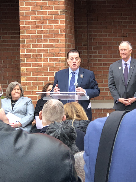 Tommy making remarks at the dedication of NAPS building to President, Vincent A. Palladino