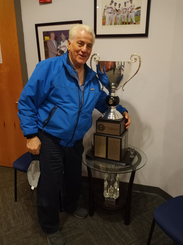 Tommy holding Brooklyn Cyclone Penn League World Championship Cup