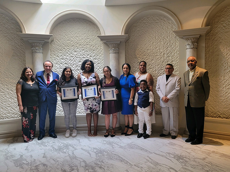 John Pescitelli, President of M3 Technology (second from left) presenting 3 Andy Sozzi Scholarships to Branch 100 winners at Marina del Rey luncheon