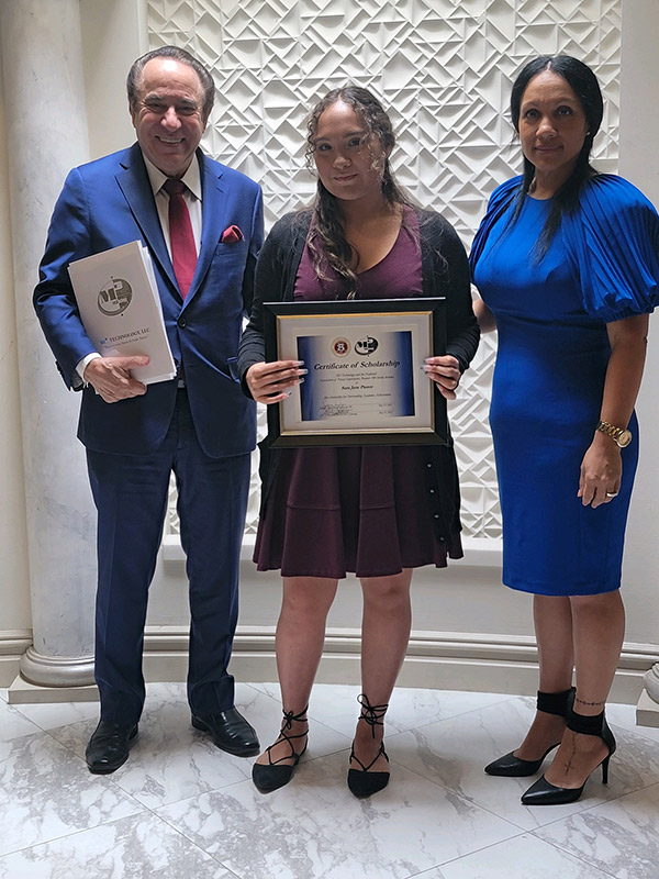 John Pescitelli presenting Scholarship Award to Sara Jane Pastor with Lijia Dyer, President Branch 100 looking on